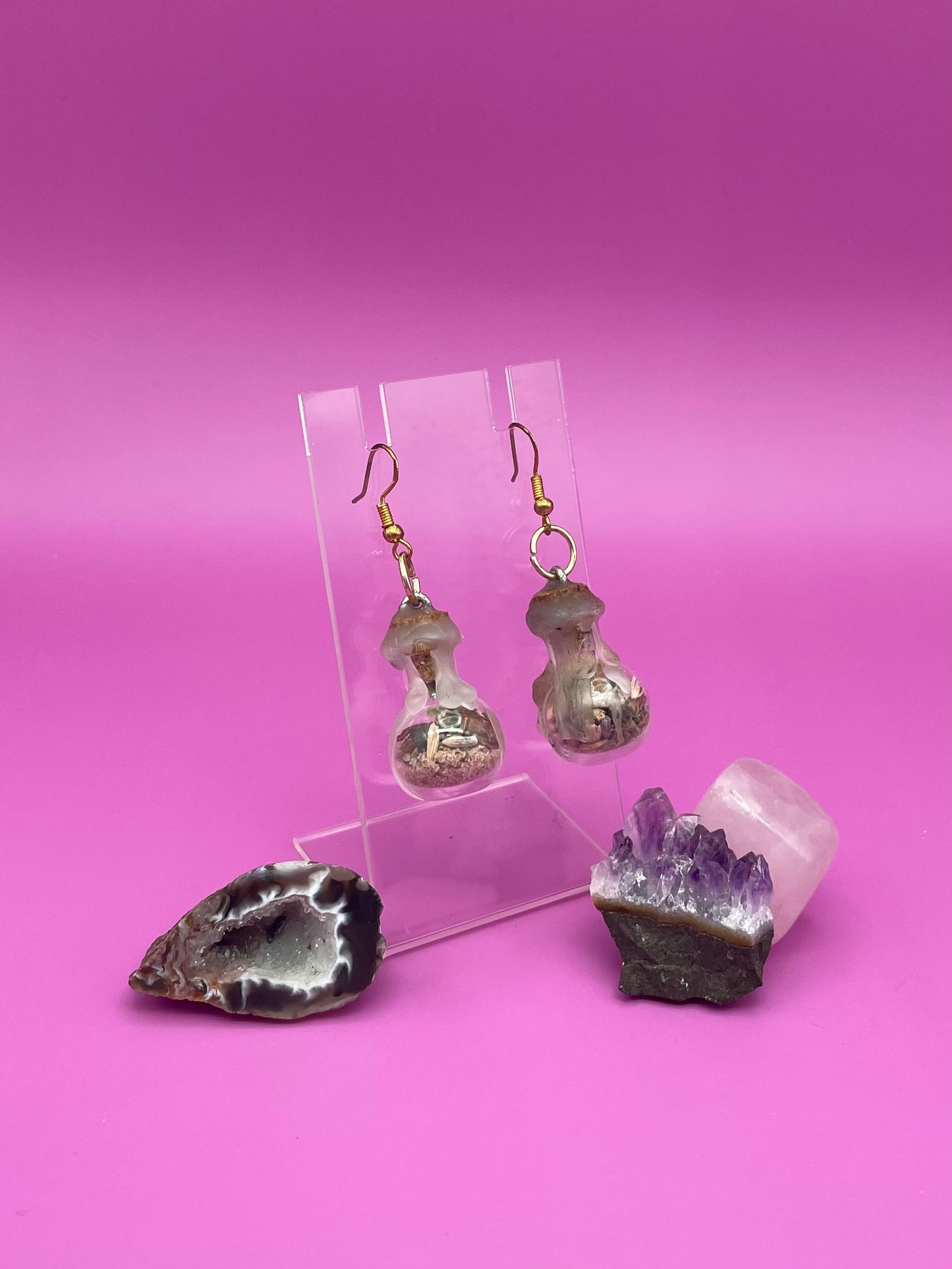 Academic success spell jar earrings on clear stand