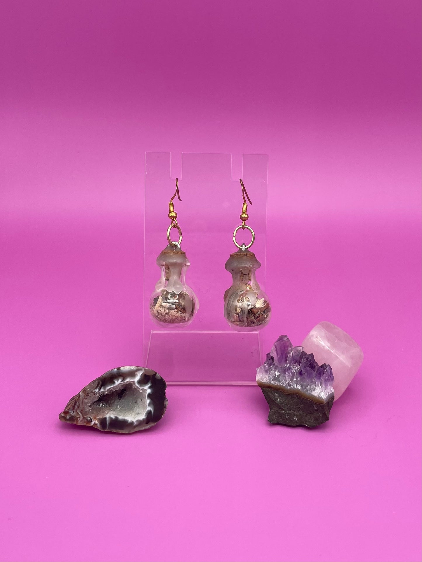 Academic success spell jar earrings on clear stand