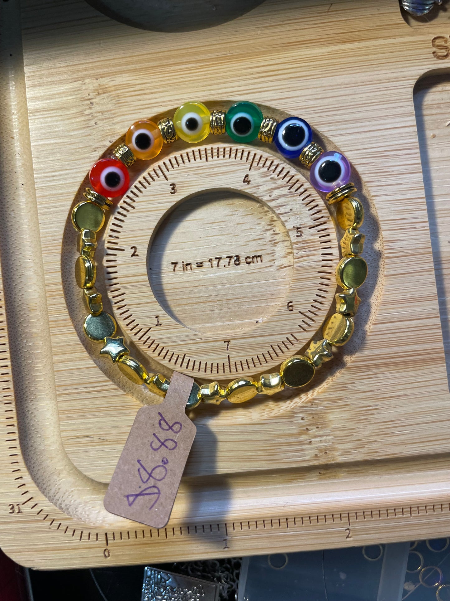 Gold and rainbow evil eye bracelet size 7in