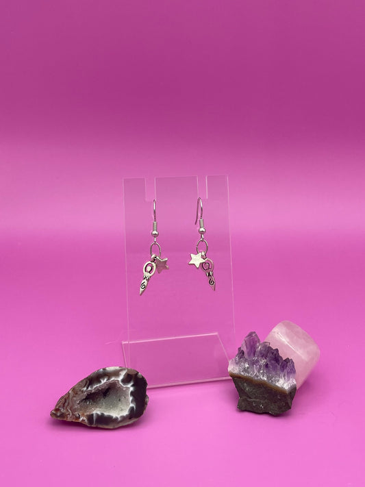 Mother of life with star earrings on clear stand 