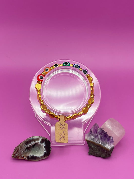 Gold and rainbow evil eye bracelet size 7in